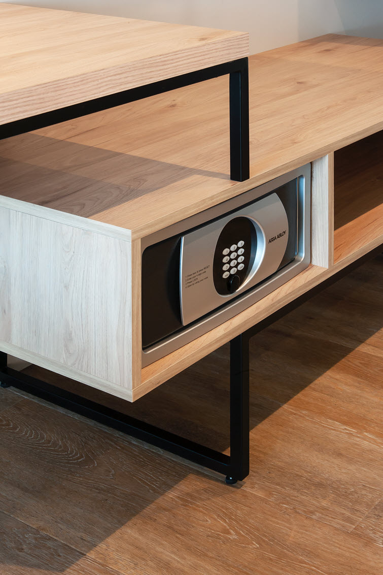 Safe hidden in cabinets from Missoury Hickory light finished with edge band